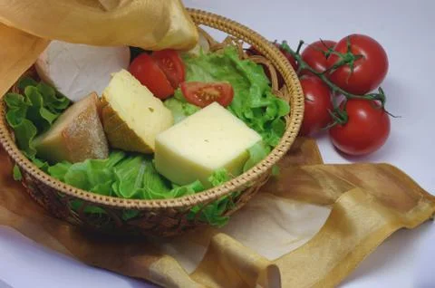 Set of cheese, cherry-tomatoes. Stock Photos