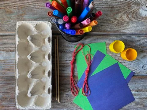 Set for children's creativity eggs box, markers ready to make a ship Stock Photos