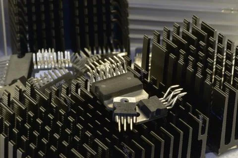 A set of chips of various audio-frequency power amplifiers against the backgr Stock Photos