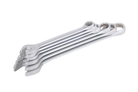 Set of chrome wrenches isolated on white background, close-up, shallow depth Stock Photos