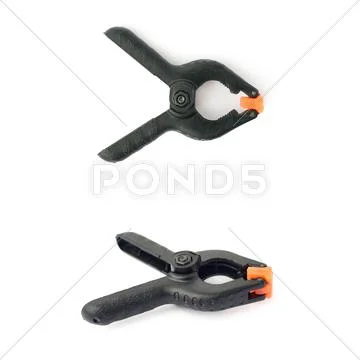 Set of Clamp with orange plastic jaws, isolated over the white background Stock Photos