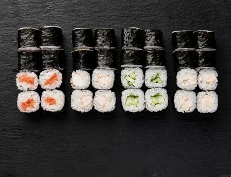 Set of classic rolls on a dark background top view 스톡 사진