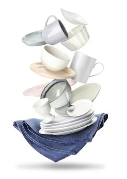 Set of clean tableware and napkin in flight on white background Stock Photos