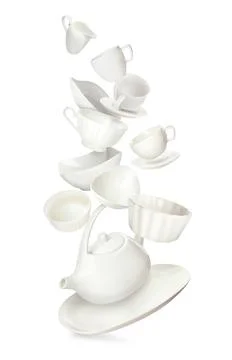 Set of clean tableware in flight on white background Stock Photos