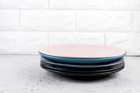 Set of clean tableware on  gray concrete background Stock-Fotos
