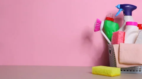 Set of cleaning products on the table on a colored background. Stock Footage 167102204