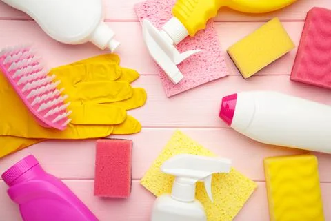Set of cleaning tools on a pink background Stock Photos