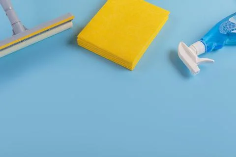 Set for cleaning windows on blue background Stock Photos