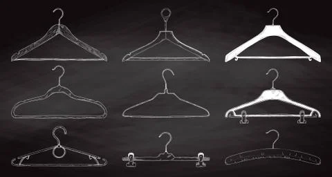 Set of clothes hangers on a chalkboard. Vector. Stock Illustration