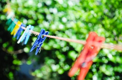 Set of clothes hangers located in the same position. The blue clothes stick.. Stock Photos
