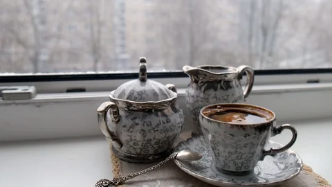 Set for coffee at a window 4K video. Stock Footage 102277166