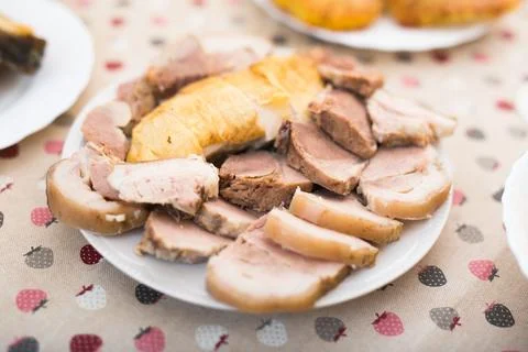Set of cold cuts of cooked chicken and pork meat on plate Foto stock