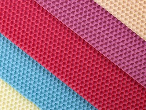 Set of colored beeswax sheets top view Stock Photos