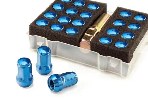 A set of colored blue wheel nuts. auto tuning and car maintenance, beautiful Stock Photos