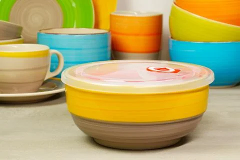 Set of colored ceramic dishware front view Stock Photos