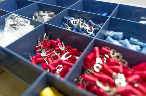 A set of colored crimp terminals for electrical wires. Crimping sleeves of Stock Photos