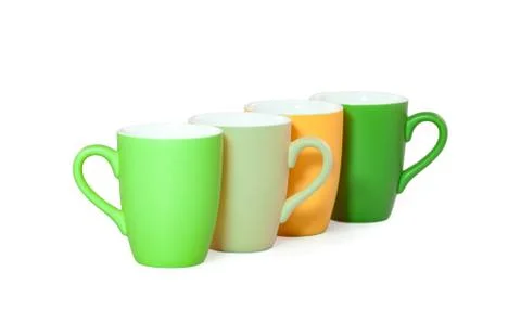 Set of colored cups isolated on white background Foto stock