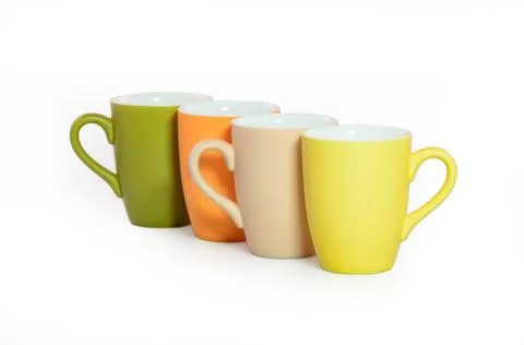 Set of colored cups isolated on white background Stock Photos