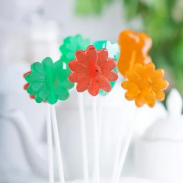 Set of colored lollipops on a stand Stock Photos