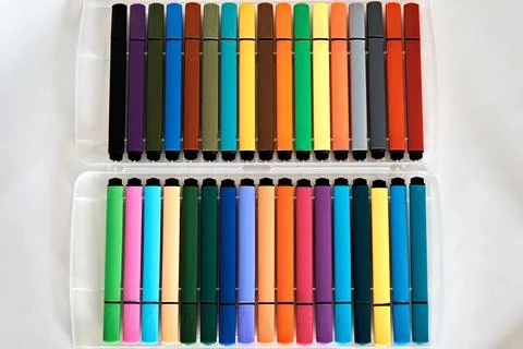 Set of colored markers for drawing on a white background. Close-up Stock Photos