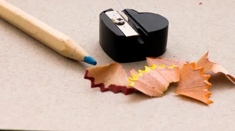 Set of colored pencils with sharpener Stock Photos