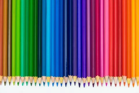 Set of colored pencils on white table Stock Photos