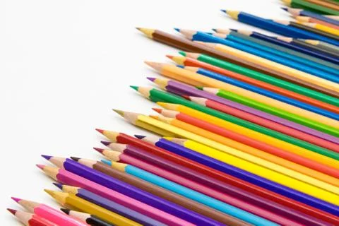 Set of colored pencils on white table Foto stock