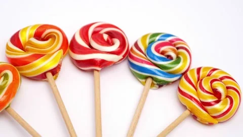 Set of colorful lollipops isolated on white. sucker and unhealthy food. rainbow Stock Footage 202317455
