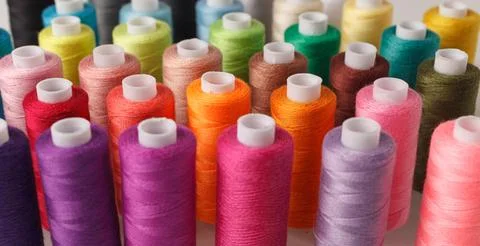 Set of colorful spools of thread Stock Photos