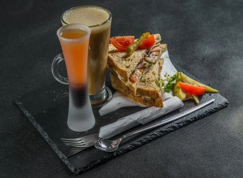 Set consisting of two sandwiches malted bread with smoke flavor bacon, pickle Stock Photos