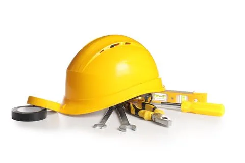 Set of construction tools and hardhat isolated on white background Stock Photos