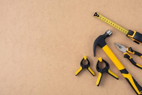Set of construction tools including hammer, pliers, clamps and tape measure o Stock Photos