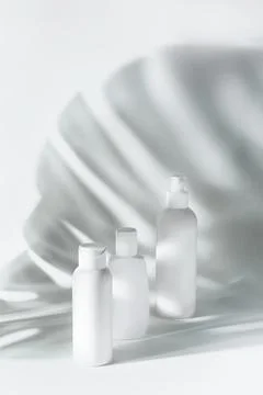 Set of cosmetic bottles on white background Stock Photos