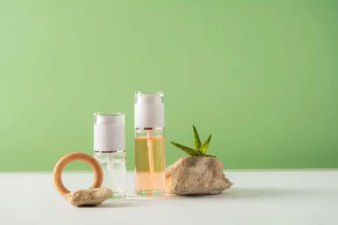 Set of cosmetics products on a green background Stock Photos