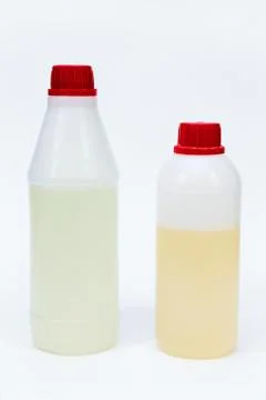 Set for creativity epoxy resin and solvent in plastic bottles Stock Photos