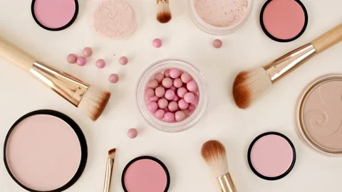 A set of decorative cosmetics on beige background. Makeup products. The beauty Stock Footage 195979270