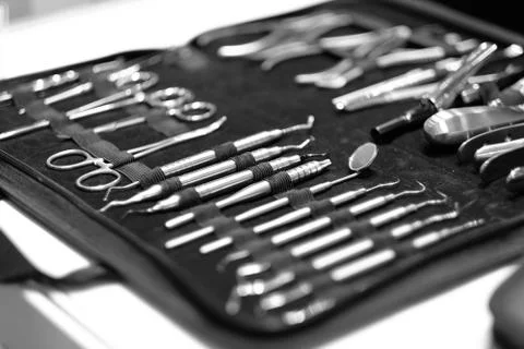 A set of dental tools in a case in the showcase of a professional exhibition. Stock Photos