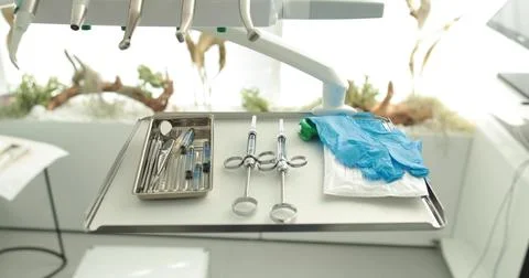 A set of dentist's tools prepared for the procedure. Dental hygiene and hea.. Stock Photos