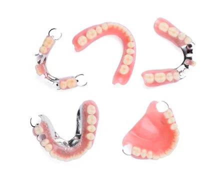Set of dentures on white background Stock Photos