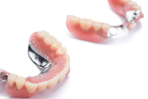 Set of dentures on white background Stock Photos