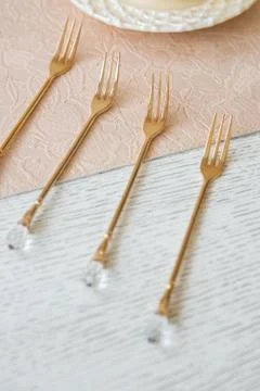 Set of Dessert Forks on Table. Copy Space Stock Photos