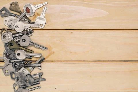 Set of different ancient keys on the table Stock Photos