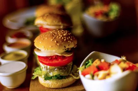 Set with different appetizers in small portions, healthy and delicious snacks Stock Photos