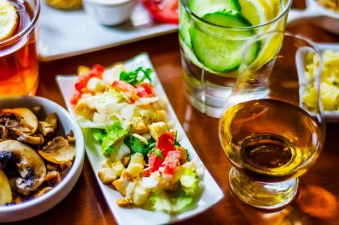 Set with different appetizers in small portions, healthy and delicious snacks Stock Photos