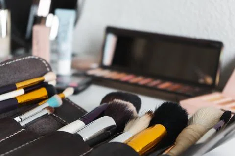 Set of different brushes of professional makeup artist, background blurred va Fotos Stock