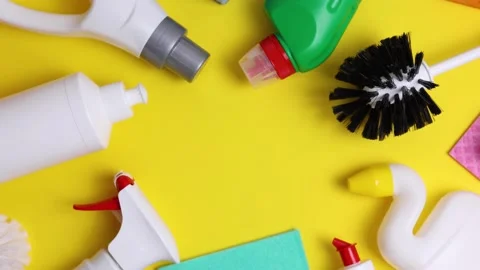 A set of different cleaning and disinfectant products on a coloured background Stock Footage 237555927