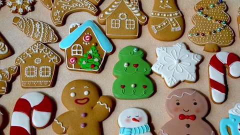 Set different colorful Gingerbread cookies with icing on table. Christmas food Stock Footage 312053827