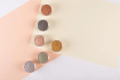 Set of different cosmetic clay mud powders on white background Stock Photos