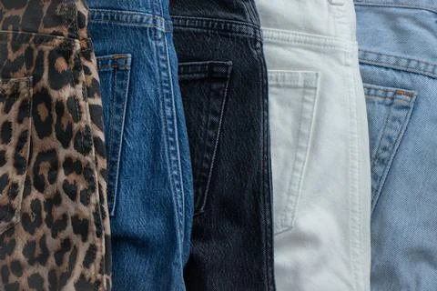 Set of different denim pants Stock Photos