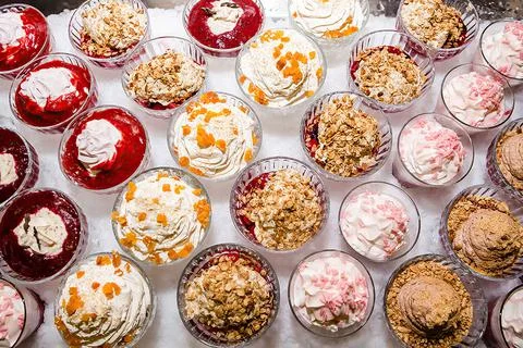Set of different desserts on the table, top view Stock Photos